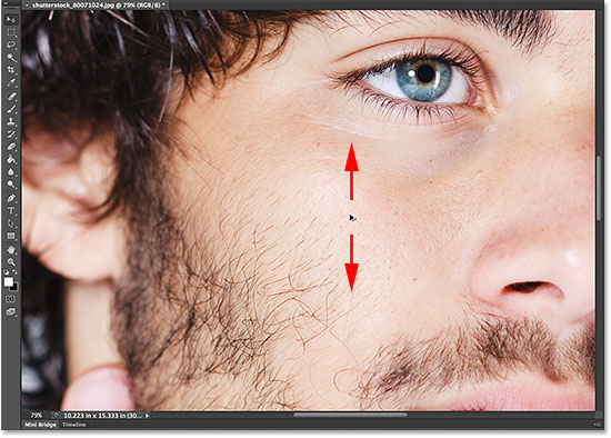 Zooming in and out of the image with the scroll wheel on the mouse. Image © 2014 Steve Patterson, Photoshop Essentials.com
