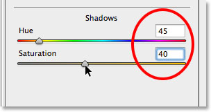 Setting the Hue and Saturation values for the Shadows section in the Split Toning panel. Image © 2014 Photoshop Essentials.com