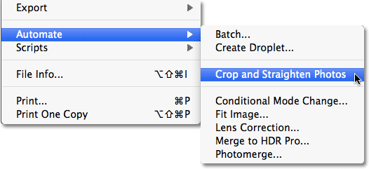 Selecting the Crop and Straighten Photos command in Photoshop. Image © 2010 Photoshop Essentials.com.