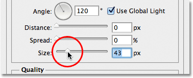 Dragging the Size slider in the Drop Shadow layer style options.