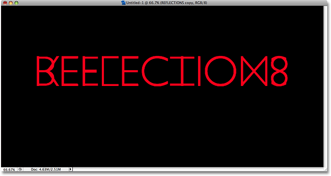 The copied text layer is now flipped upside down. Image © 2009 Photoshop Essentials.com