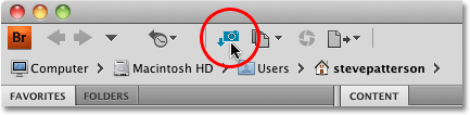 The Get Photos from Camera icon in Adobe Bridge CS4. Image © 2010 Photoshop Essentials.com.
