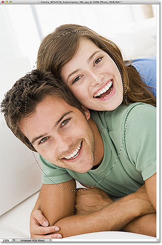 The elliptical selection outline has been feathered by 30 pixels. Image © 2011 Photoshop Essentials.com