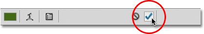 Clicking the checkmark to accept the text. Image © 2011 Photoshop Essentials.com