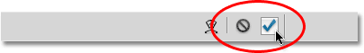 The Commit and Cancel icons for the transform modes in Photoshop. Image © 2010 Photoshop Essentials.com