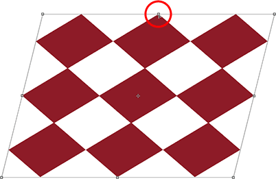 Distorting the image with Free Transform by dragging a side handle. Image © 2010 Photoshop Essentials.com