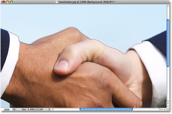 Drawing a selection outline with the Lasso Tool. Image © 2009 Photoshop Essentials.com