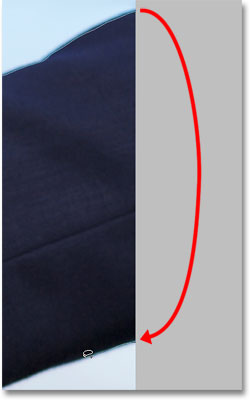 Moving into the pasteboard area with the Lasso Tool to select edge pixels. Image © 2009 Photoshop Essentials.com