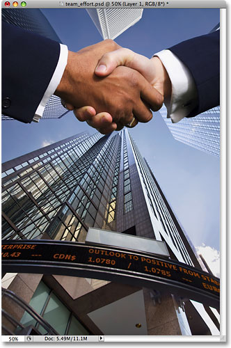 The selection has been pasted into the second image in Photoshop. Image © 2009 Photoshop Essentials.com