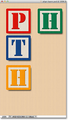 Aligning the left edges of the three blocks. Image © 2011 Photoshop Essentials.com