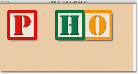 Aligning the blocks to their top edges. Image © 2011 Photoshop Essentials.com