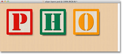 Distributing the blocks horizontally in the document. Image © 2011 Photoshop Essentials.com