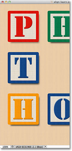 Spacing the three left blocks vertically. Image © 2011 Photoshop Essentials.com
