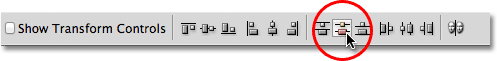 The Distribute Vertical Centers option in the Options Bar. Image © 2011 Photoshop Essentials.com