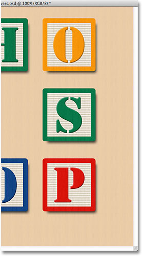 The right blocks are now spaced equally. Image © 2011 Photoshop Essentials.com
