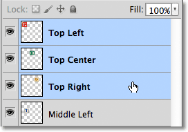 Selecting three layers at once in the Layers panel in Photoshop. Image © 2011 Photoshop Essentials.com