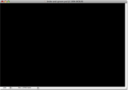 Photoshop plays the step and fills the document window with black. Image copyright © 2008 Photoshop Essentials.com