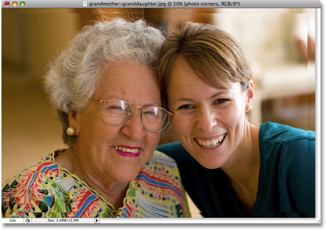The copy of the image on the Background layer is now 95% its original size. Image copyright © 2008 Photoshop Essentials.com