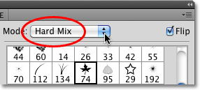 Changing the Dual Brush blend mode to Hard Mix in Photoshop. Image © 2010 Photoshop Essentials.com