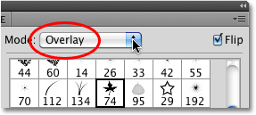 Changing the Dual Brush blend mode to Overlay in Photoshop. Image © 2010 Photoshop Essentials.com