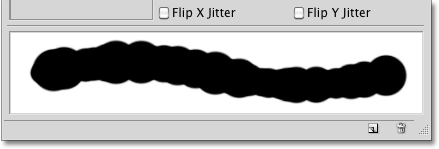 A preview of the brush stroke with Size Jitter applied. Image © 2010 Photoshop Essentials.com