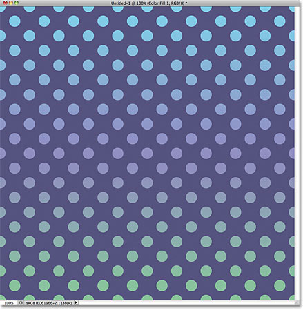 The circle pattern now appears in front of a black background. Image © 2011 Photoshop Essentials.com