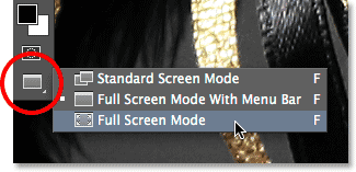 Selecting Full Screen Mode from the Tools panel in Photoshop.