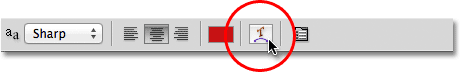 Clicking the Warp Text option in the Options Bar in Photoshop. Image © 2011 Photoshop Essentials.com