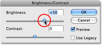 Increasing the Brightness value to +50. Image © 2009 Photoshop Essentials.com.
