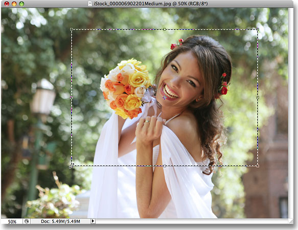 Resizing and moving the selection outline in Photoshop. Image © 2008 Photoshop Essentials.com