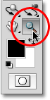 Selecting the Zoom Tool from the Tools palette in Photoshop. Image © 2010 Photoshop Essentials.com