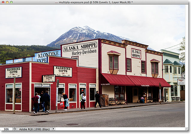 The photo after changing the blend mode of the adjustment layer to Multiply. Image © 2011 Photoshop Essentials.com