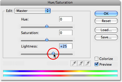 Drag the Lightness slider to the right to brighten the teeth. Image © 2008 Photoshop Essentials.com.