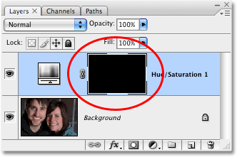 The layer mask for the adjustment layer has been filled with black. Image © 2008 Photoshop Essentials.com.