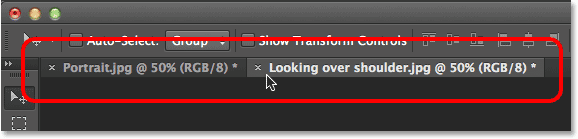 Switching between open images by clicking on their document tabs. Image © 2014 Photoshop Essentials.com