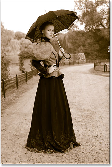 The image after applying the sepia toning in the Camera Raw Filter. Image © 2014 Photoshop Essentials.com
