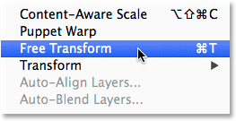 Selecting Free Transform from the Edit menu. Image © 2014 Photoshop Essentials.com.