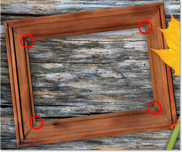 Selecting the photo area of the frame with the Polygonal Lasso Tool. Image © 2014 Photoshop Essentials.com.