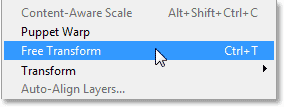 Choosing the Free Transform command from the Edit menu. Image © 2013 Photoshop Essentials.com