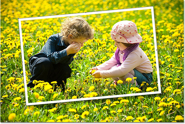 Resizing and rotating the image with Free Transform. Image © 2013 Photoshop Essentials.com