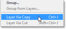 Selecting the New Layer Via Copy command in Photoshop CS6. Image © 2013 Photoshop Essentials.com