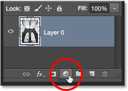 Clicking the New Fill or Adjustment Layer icon. Image © 2014 Photoshop Essentials.com.