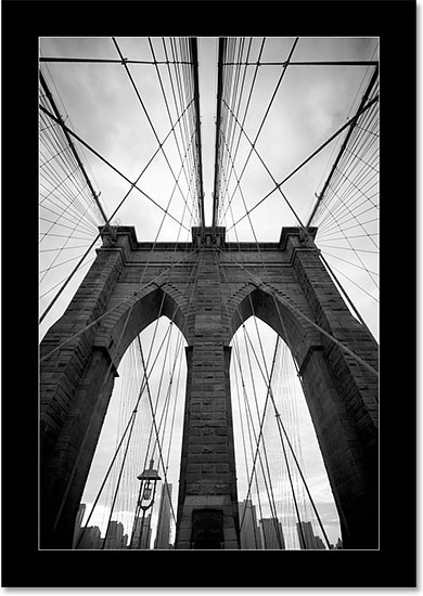 A black photo border with white outline created in Photoshop. Image © 2014 Photoshop Essentials.com.