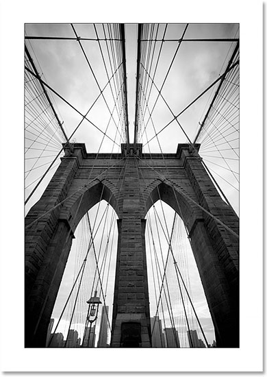 A white photo border with a black outline created in Photoshop. Image © 2014 Photoshop Essentials.com.
