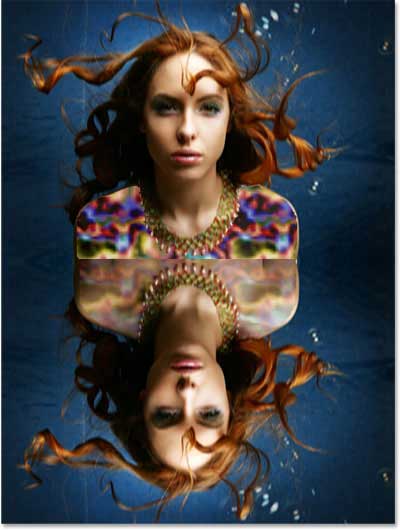 The image after applying the Motion Blur filter. Image © 2013 Photoshop Essentials.com