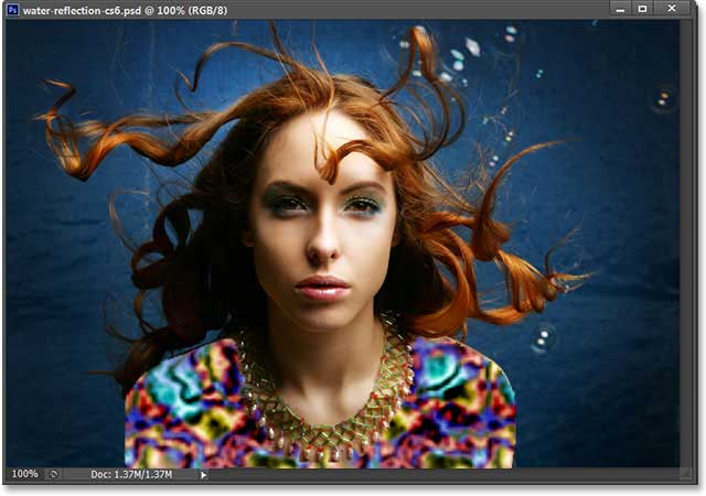 The original photo used in the Water Reflection tutorial. Image licensed from iStockPhoto by Photoshop Essentials.com