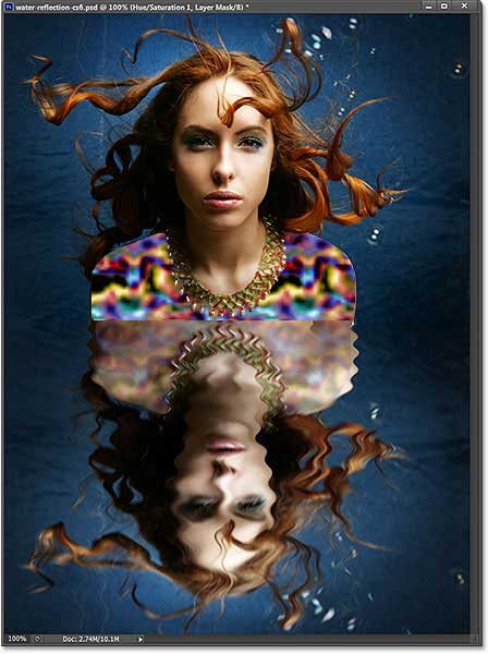 The final water reflection effect in Photoshop CS6. Image © 2013 Photoshop Essentials.com