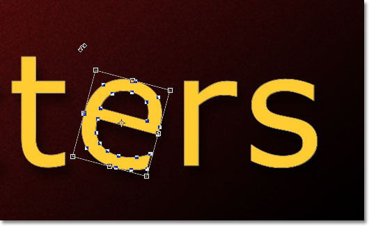 Rotating the second letter 'e' with Free Transform. Image © 2011 Photoshop Essentials.com.