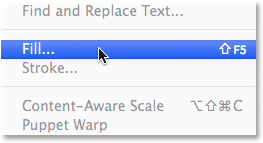 Choosing the Fill command from the Edit menu in Photoshop. 